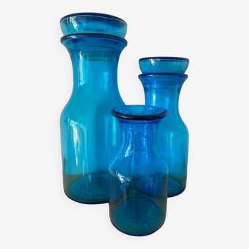 Trio of blue apothecary bottles