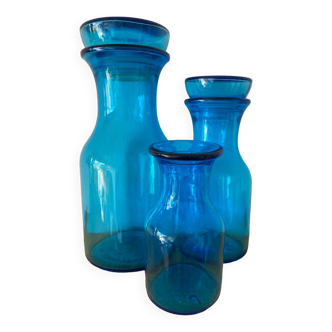 Trio of blue apothecary bottles