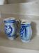 2 antique stoneware pitchers