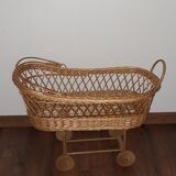 Vintage wicker cradle with wheels