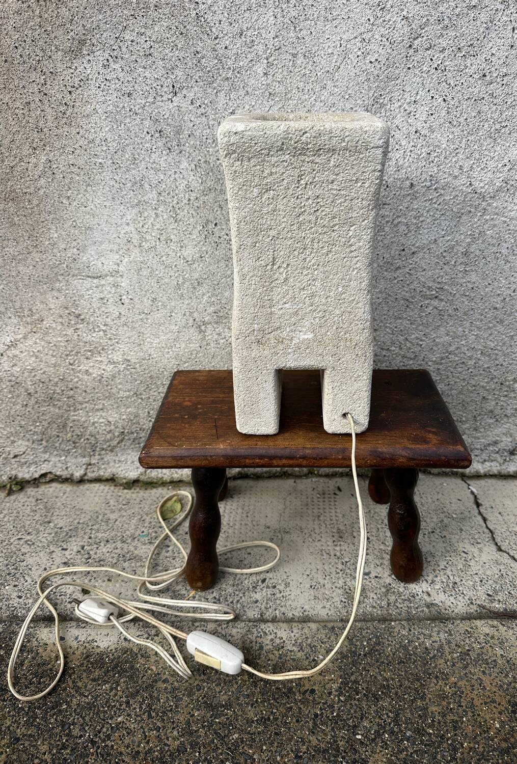 Anthropomorphic stone table lamp brutalised by Albert Tormos.