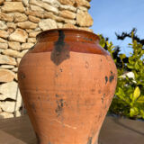 Ancient terracotta pottery jar
