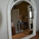 White mirror in 90s Art Deco style
