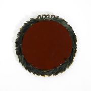 Beautiful small French mid-century wall mirror with an ornate brass frame