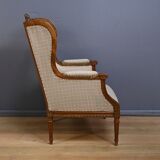 Wingback armchair in walnut, Louis XVI style – late 19th century