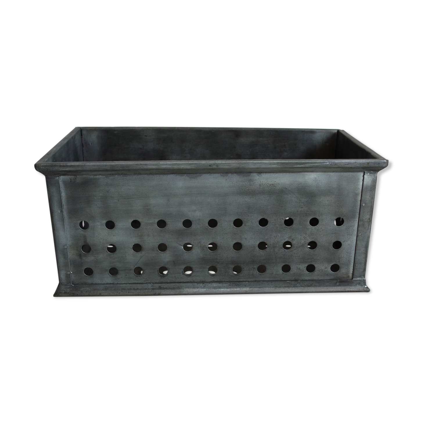 Old industrial box perfoated metal