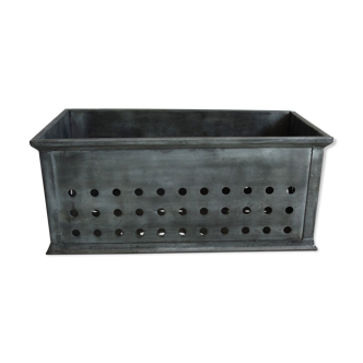 Old industrial box perfoated metal