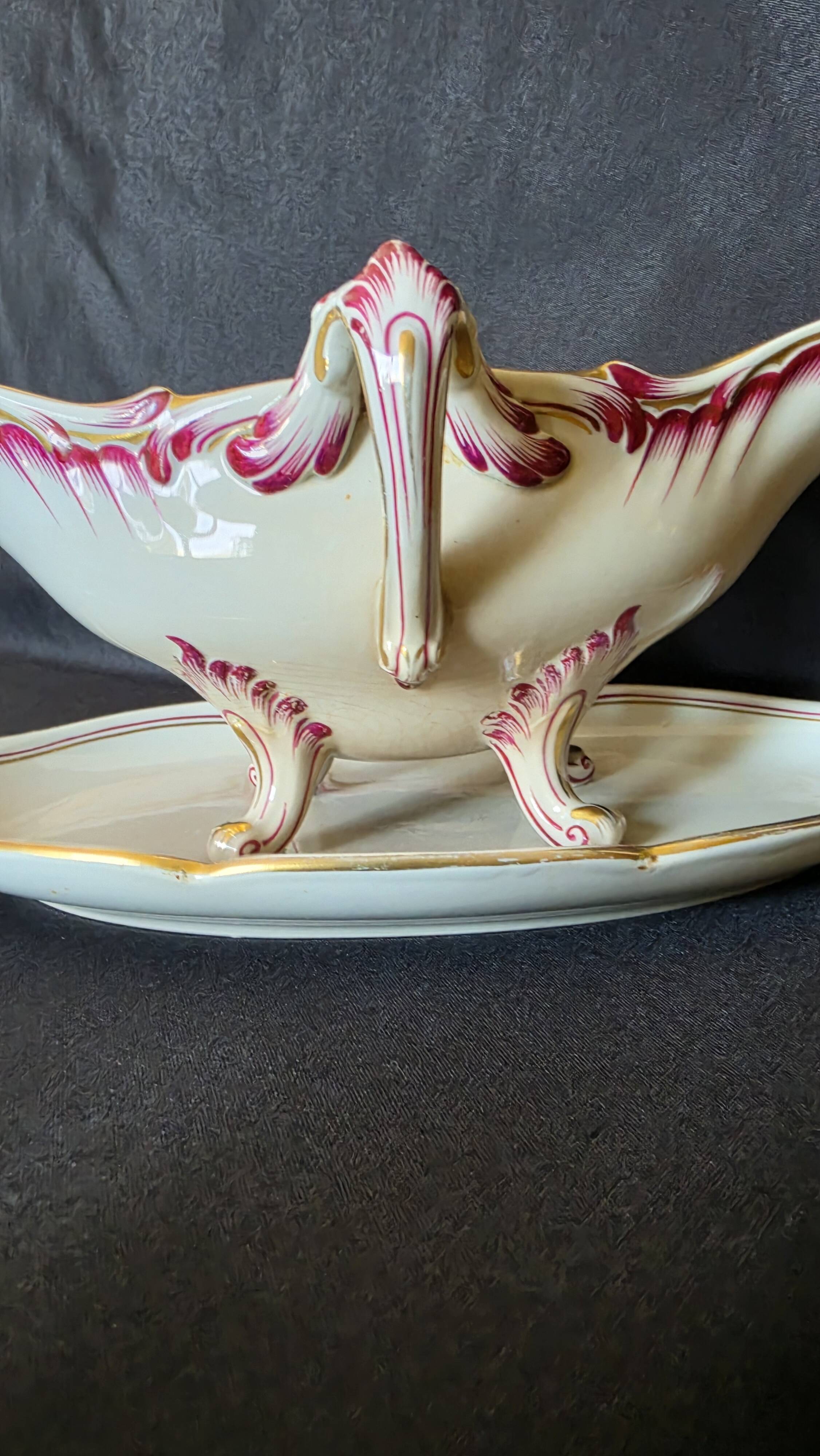 Antique sauce boat in fine earthenware from Sarreguemines, France, neo style.