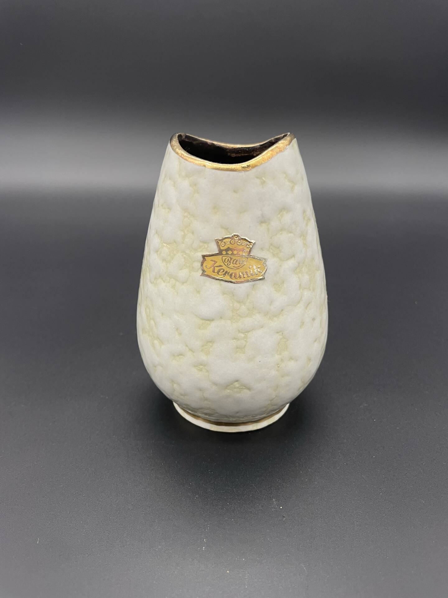 Small Bay Keramik vase with pearlescent glaze and gold trim.