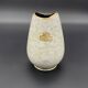 Small Bay Keramik vase with pearlescent glaze and gold trim.