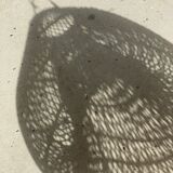 Small rattan lampshade in the shape of a braided hat