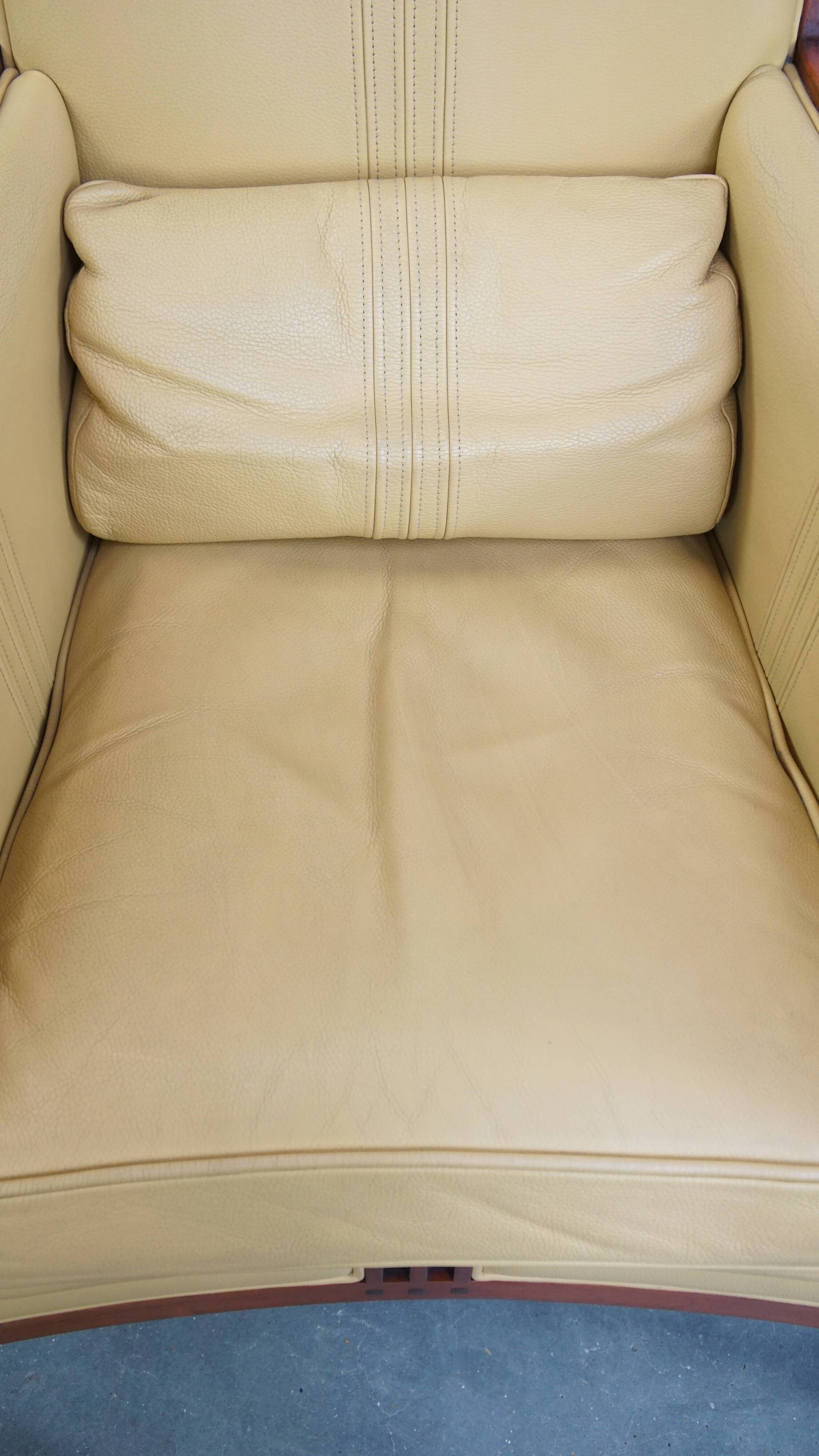 Art Deco armchair in yellow leather with high back