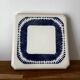 Vintage old trivet Badonviller blue graphic pattern