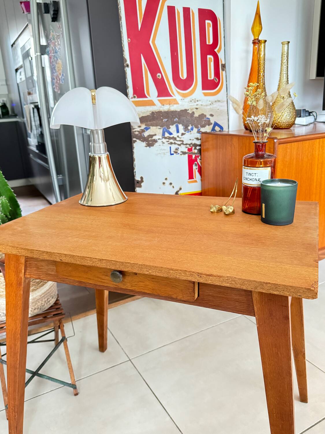 Old wooden desk or side table with compass legs