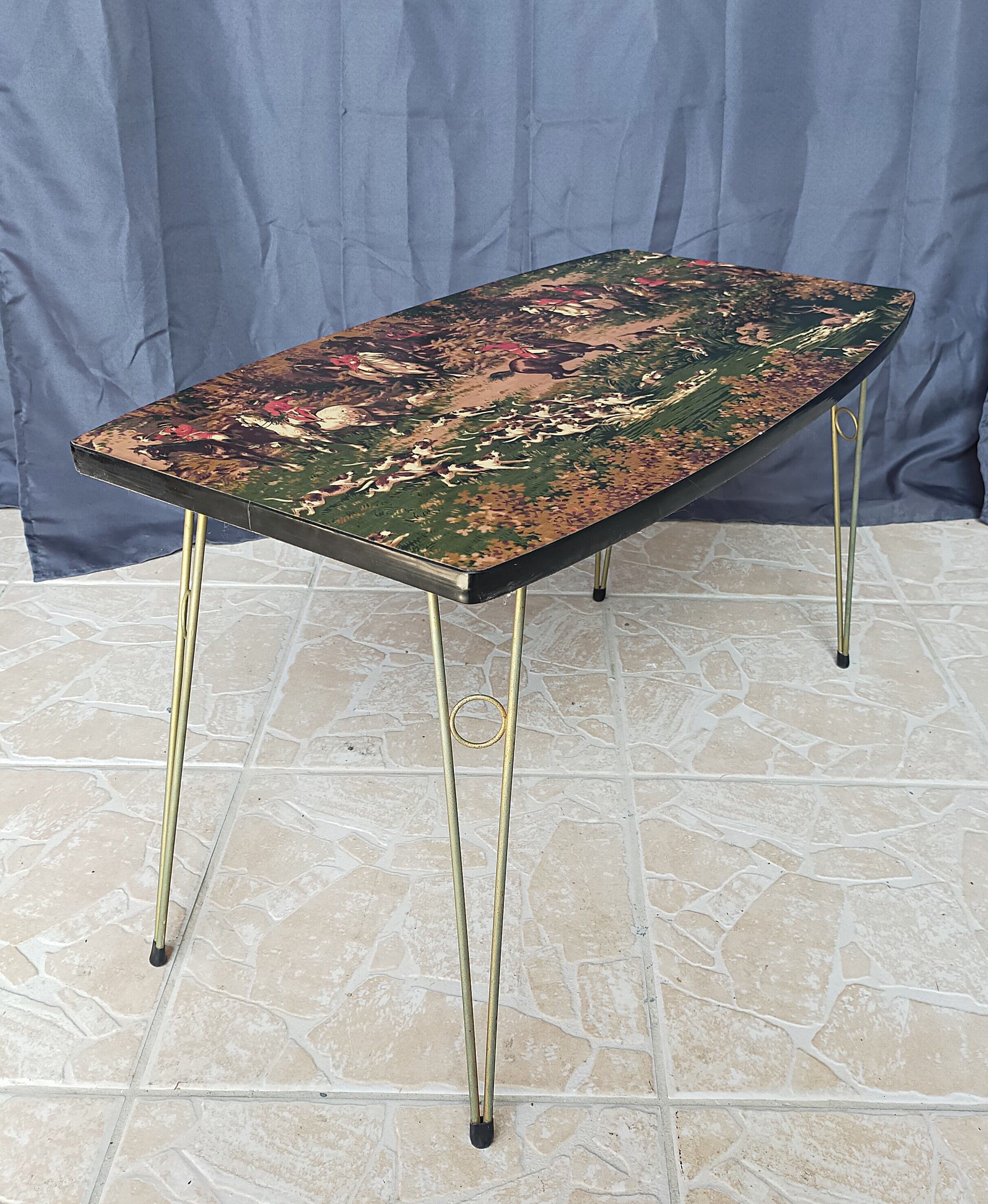 Vintage coffee table hunting scene
