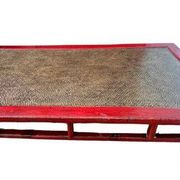 Vintage old opium bed in wooden rice straw cane