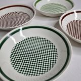 Set of four hollow plates with checkerboard decoration of the faience factory of Gien, 20 cm