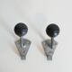 Pair of school coat hooks in Bakelite and metal from the 1950s.