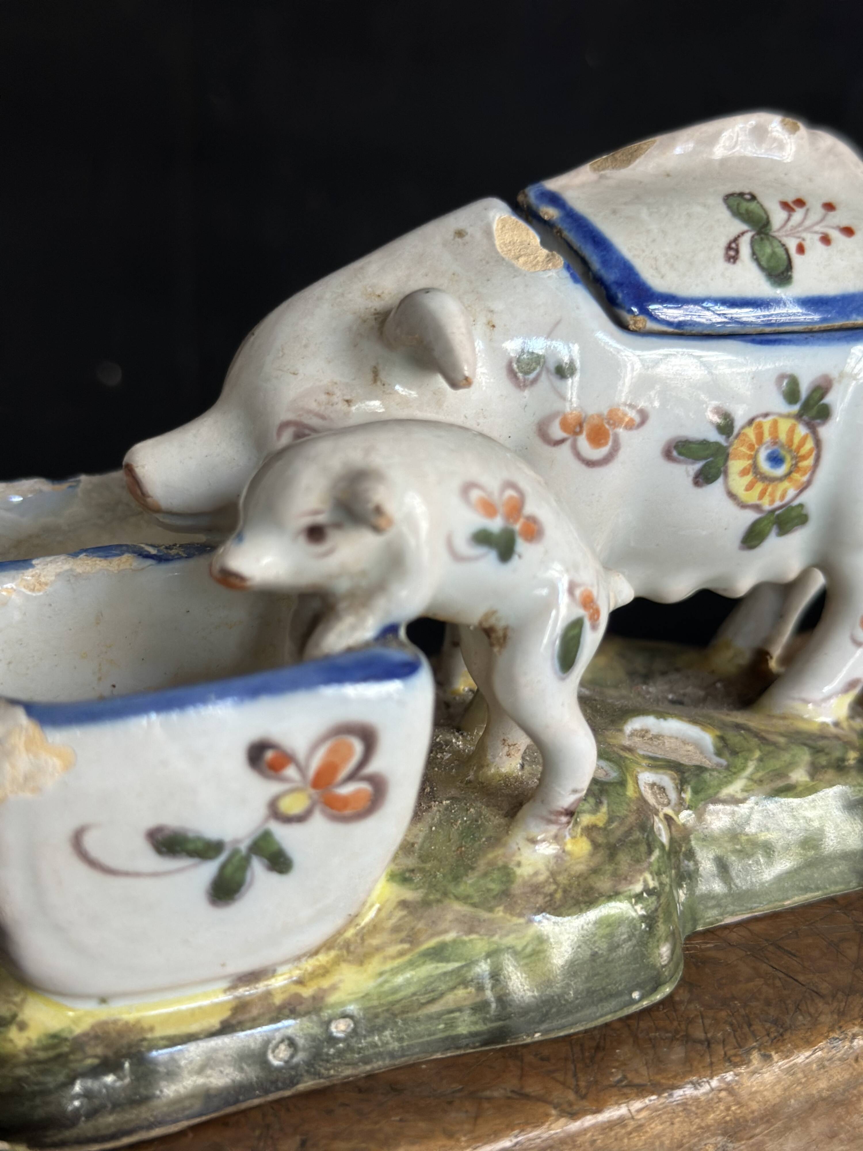 Antique earthenware pig box, salt cellar or mustard pot, floral decoration.