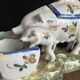 Antique earthenware pig box, salt cellar or mustard pot, floral decoration.