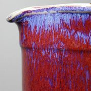 Large artistic stoneware vase by Lévéjac Michel Goldstyn, with flamed oxblood glaze.