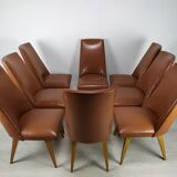 8 brown skai chairs 1950