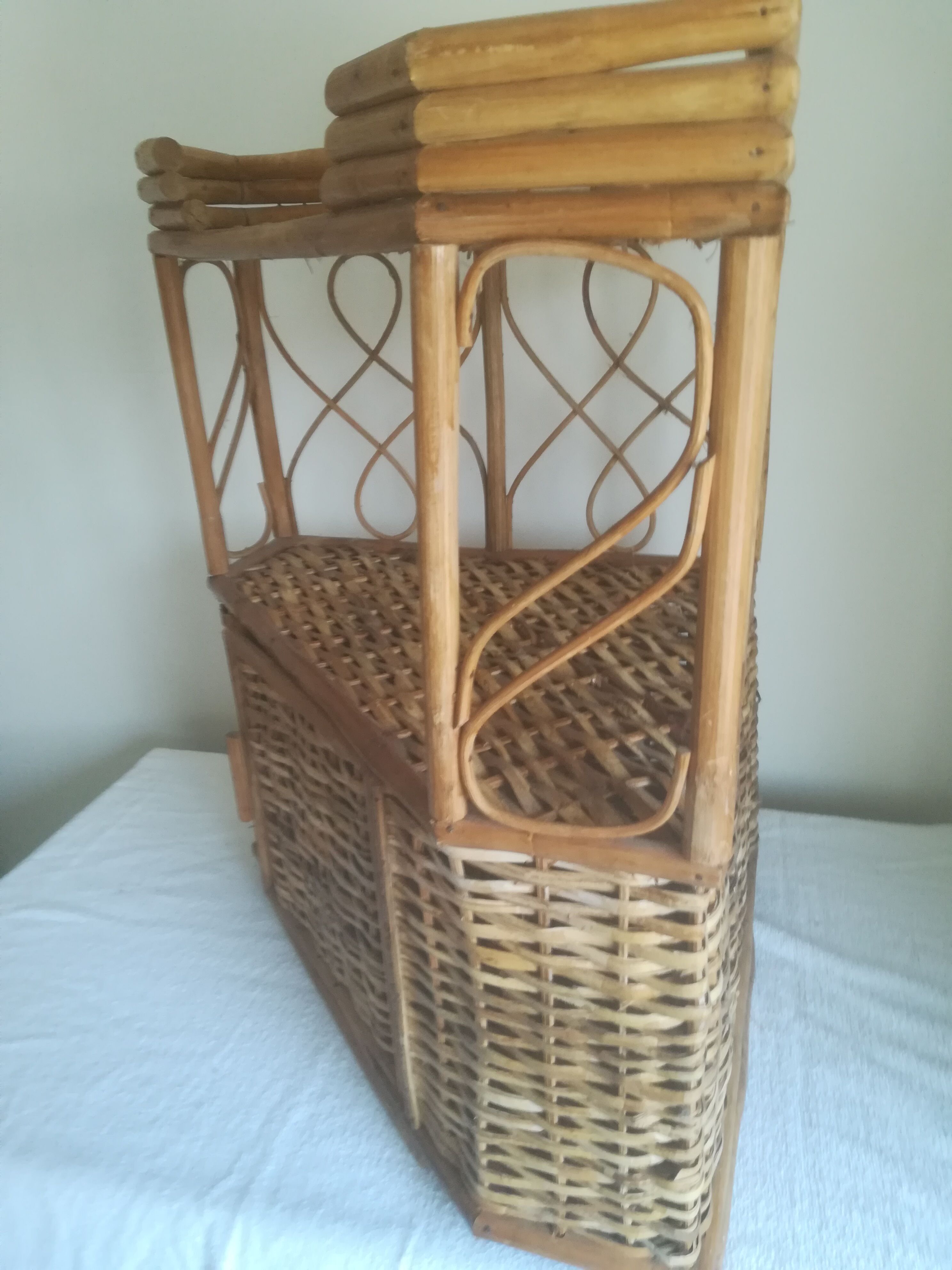 Vintage corner rattan shelf