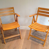 Pair of folding armchairs in varnished wood signed Clairitex