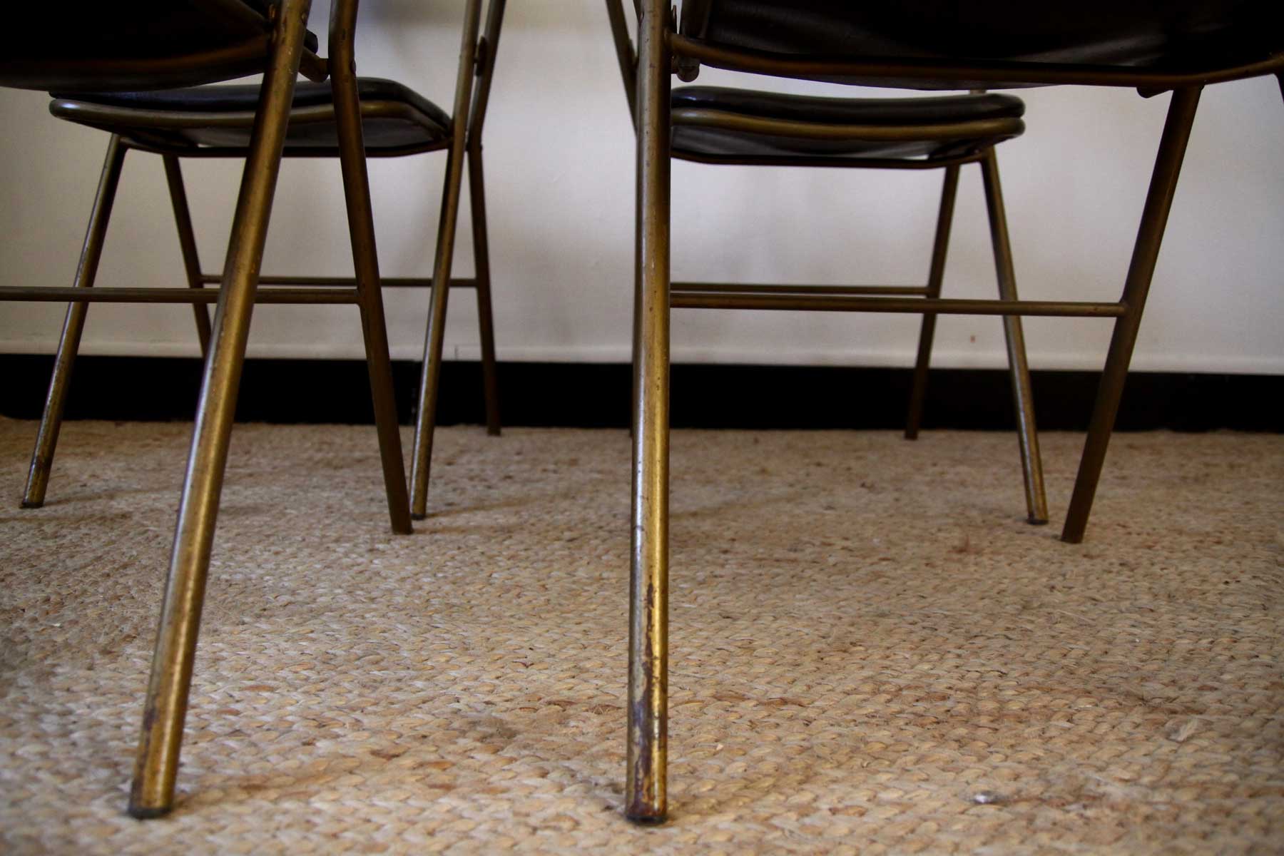 Lot of 4 metal and skai folding chairs