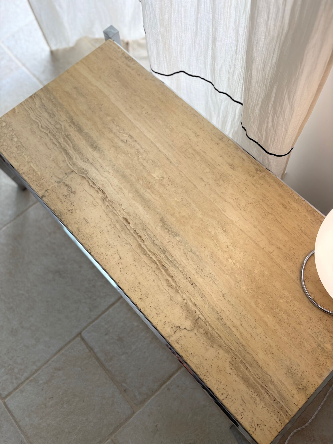 Chrome metal and travertine coffee table, 1970.