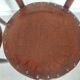 pair of round bistro chairs with a pattern on the seat, vintage
