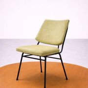 Vintage 1950s chair in black metal and almond green fabric.