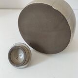 Beige stoneware teapot with stylized flowers and rattan handle