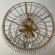 Brass hot air balloon chandelier with cascade of tassels