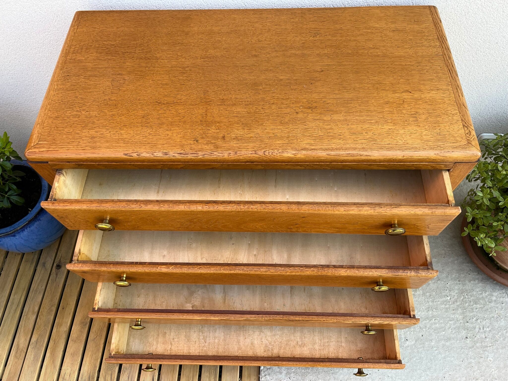 Oak art deco chest of drawers, compass legs