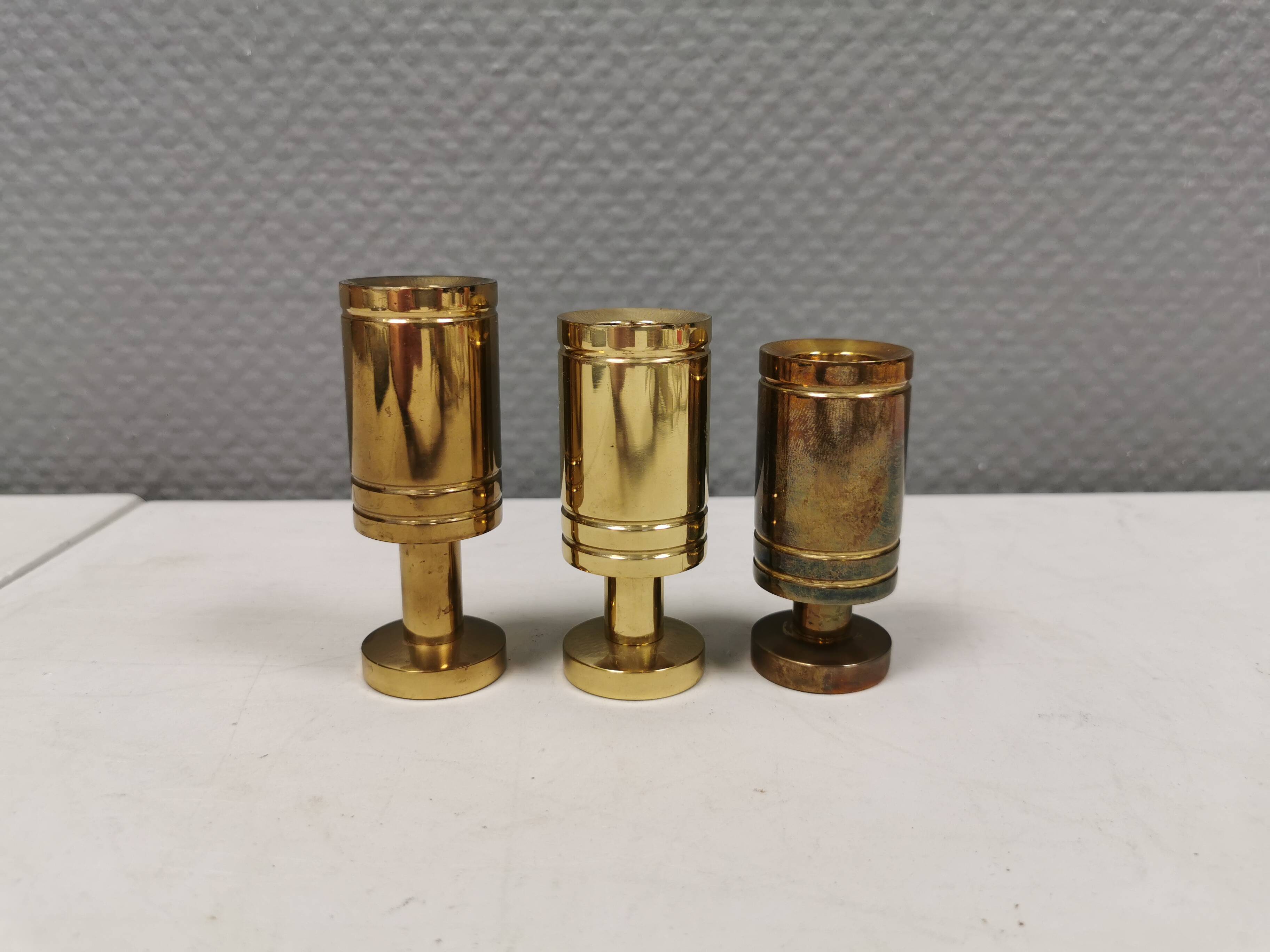 3 beautiful Danish designed candle holders in solid brass.