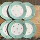 6 flat mint plates and golden flowers