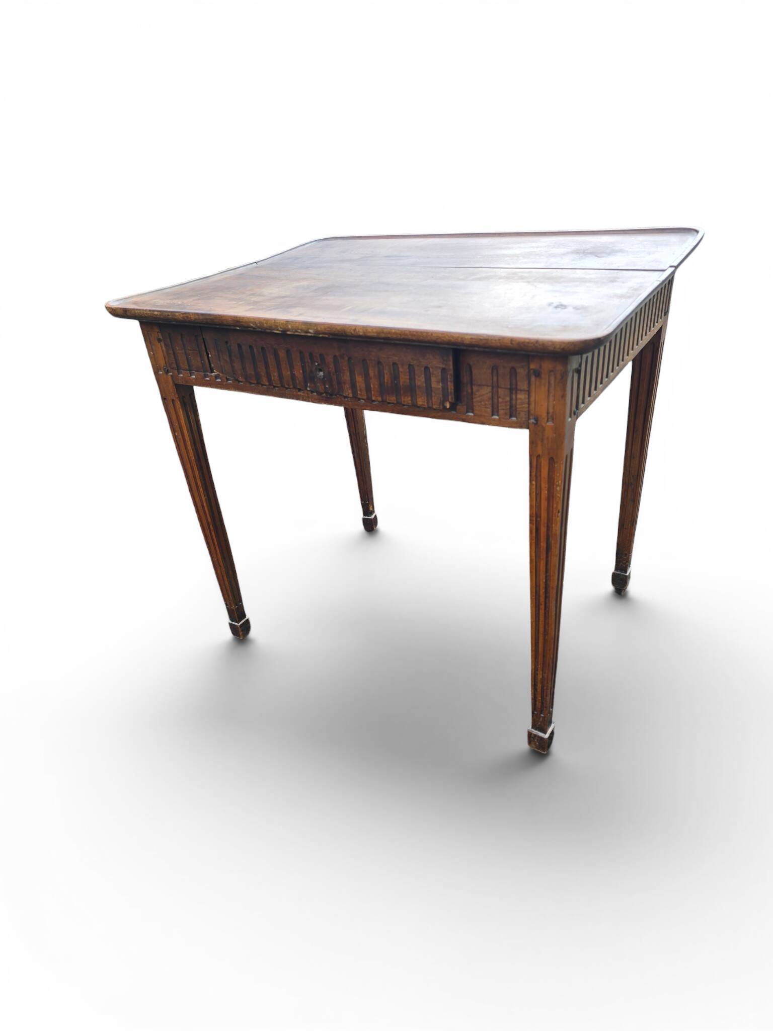 Antique game table in patinated wood in the Louis XVI style.