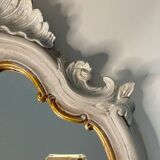 Magnificent patinated and gilded baroque style mirror