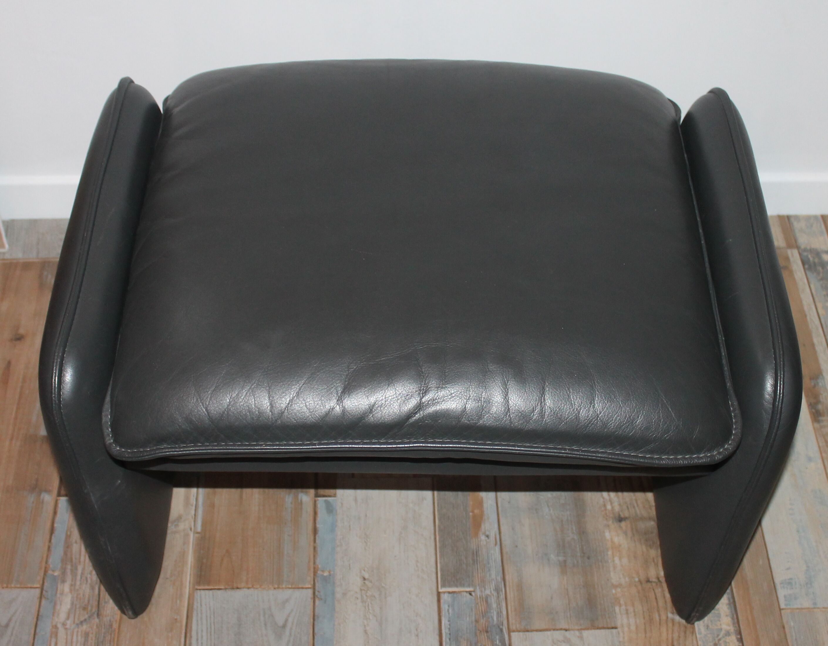 Fauteuil et ottoman cuir Leolux par Axel van Enthoven