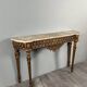 Louis XVI style console in carved wood with a gilded patina, 19th century.