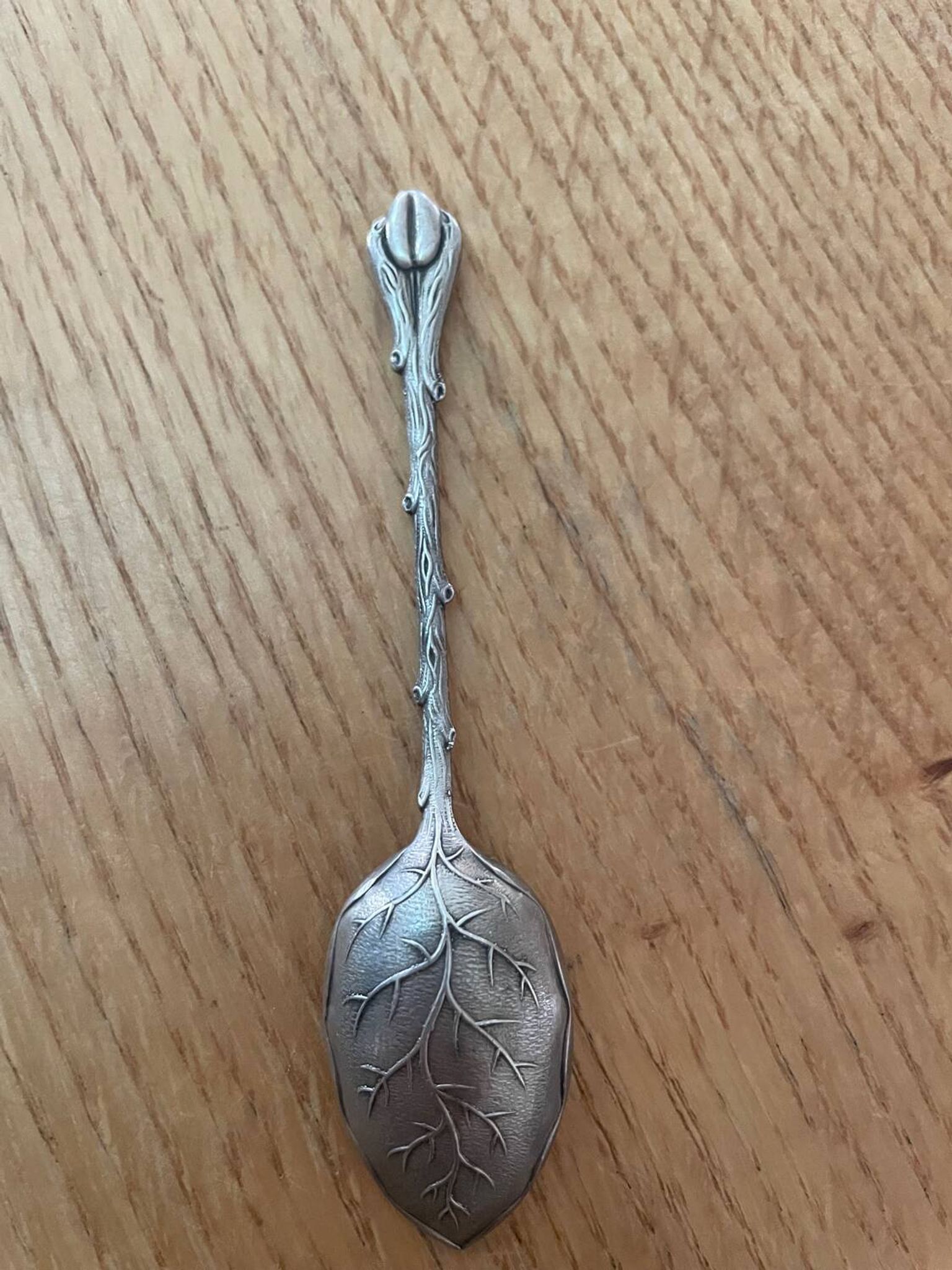 12 cuillères à moka en métal argenté