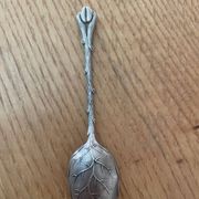 12 cuillères à moka en métal argenté