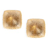 Pairs of amber glass wall lights in the shape of a fingerprint, Germany, 1970s.