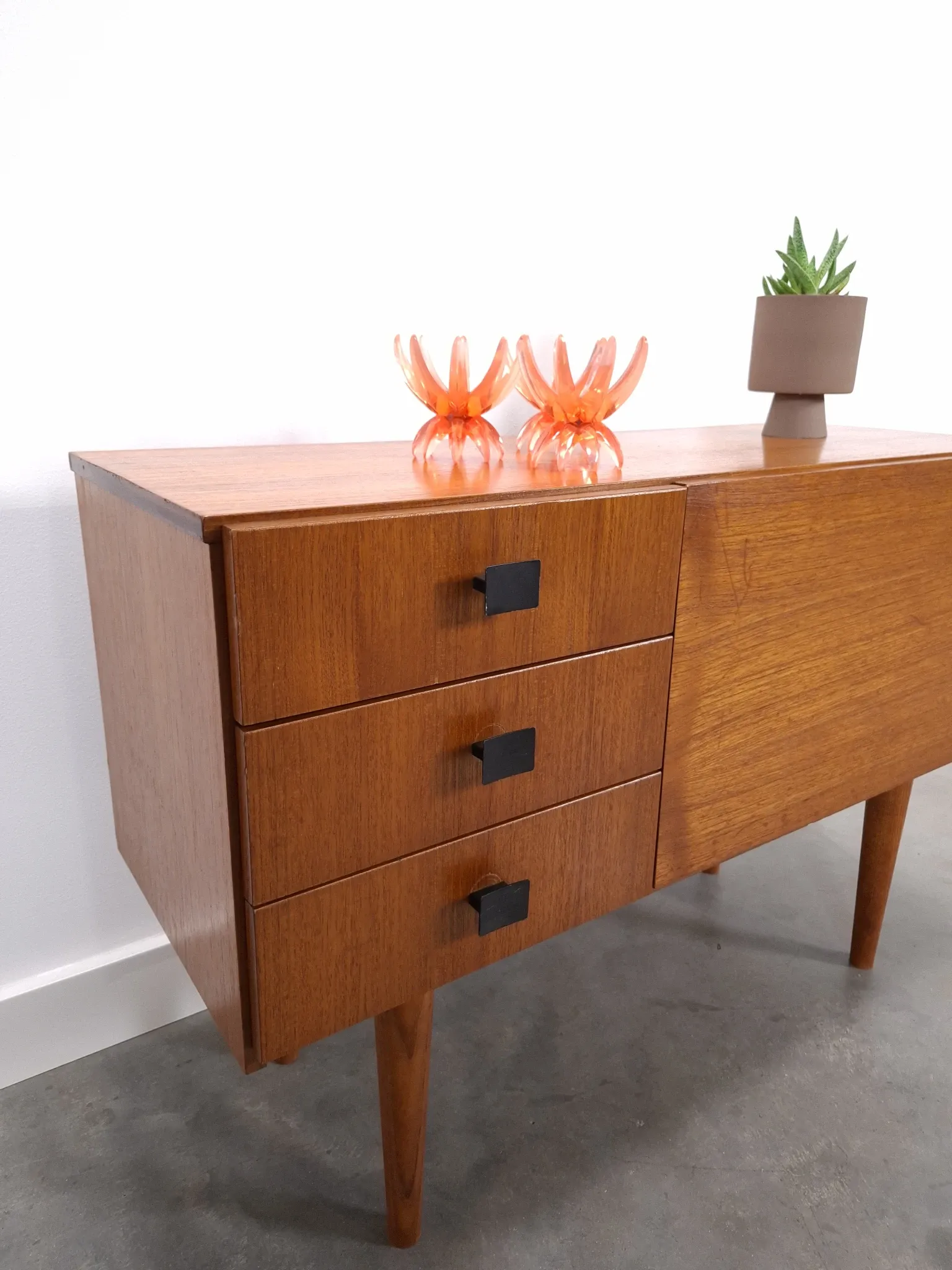 Vintage small teak cabinet with drawers, flap and black handles, hallway cabinet.