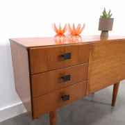 Vintage small teak cabinet with drawers, flap and black handles, hallway cabinet.