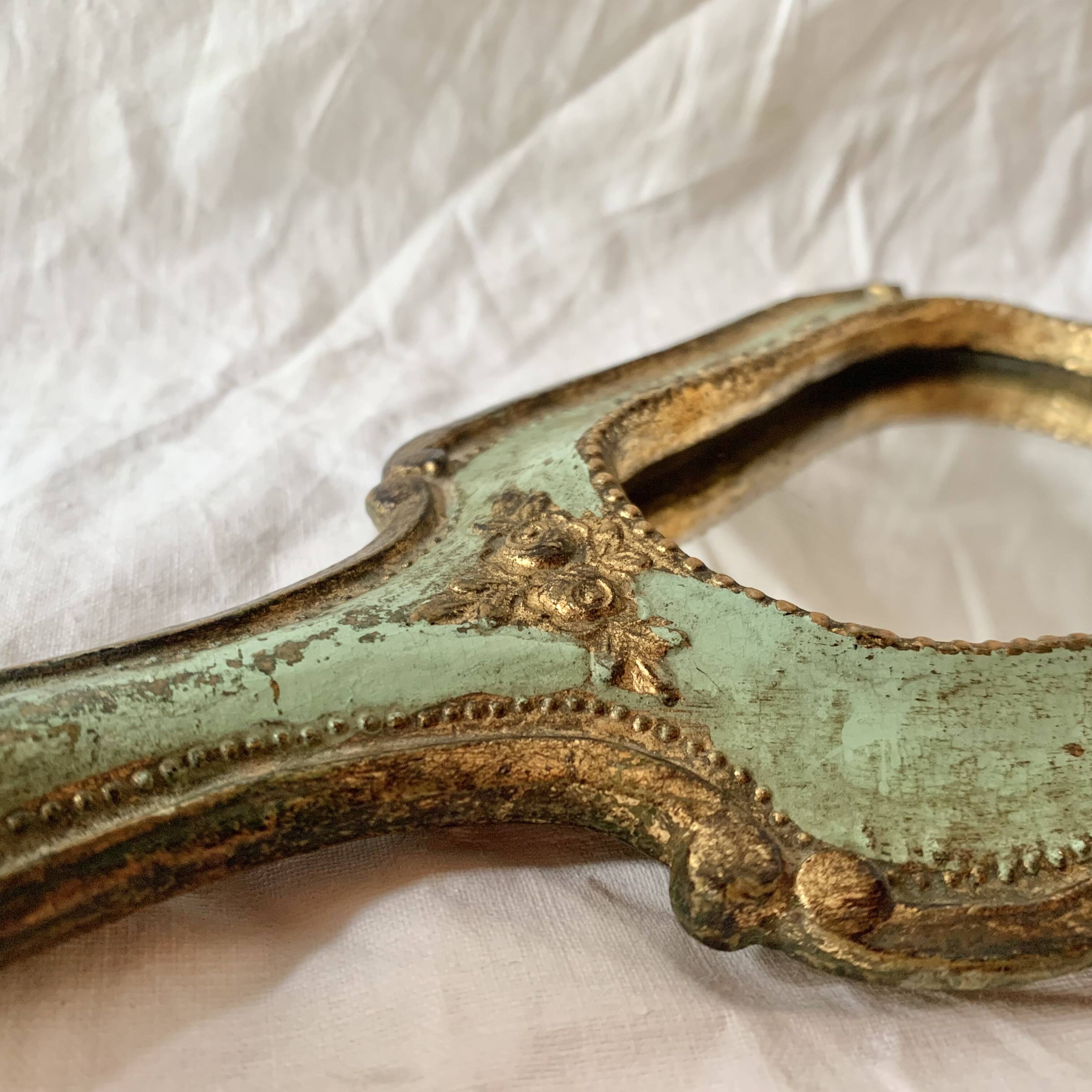 Old Florentine style carved wooden hand mirror