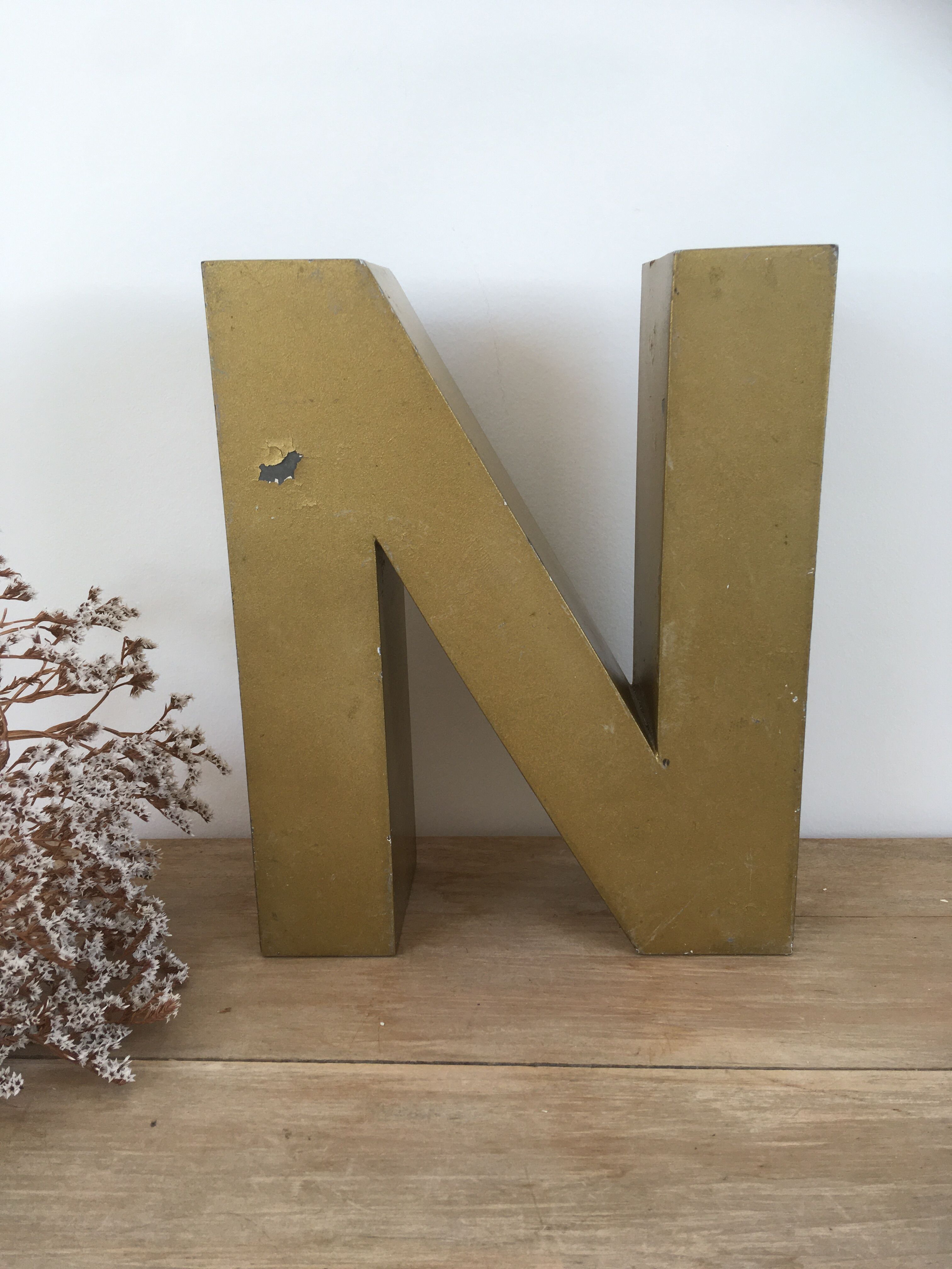 Golden vintage sign letter N