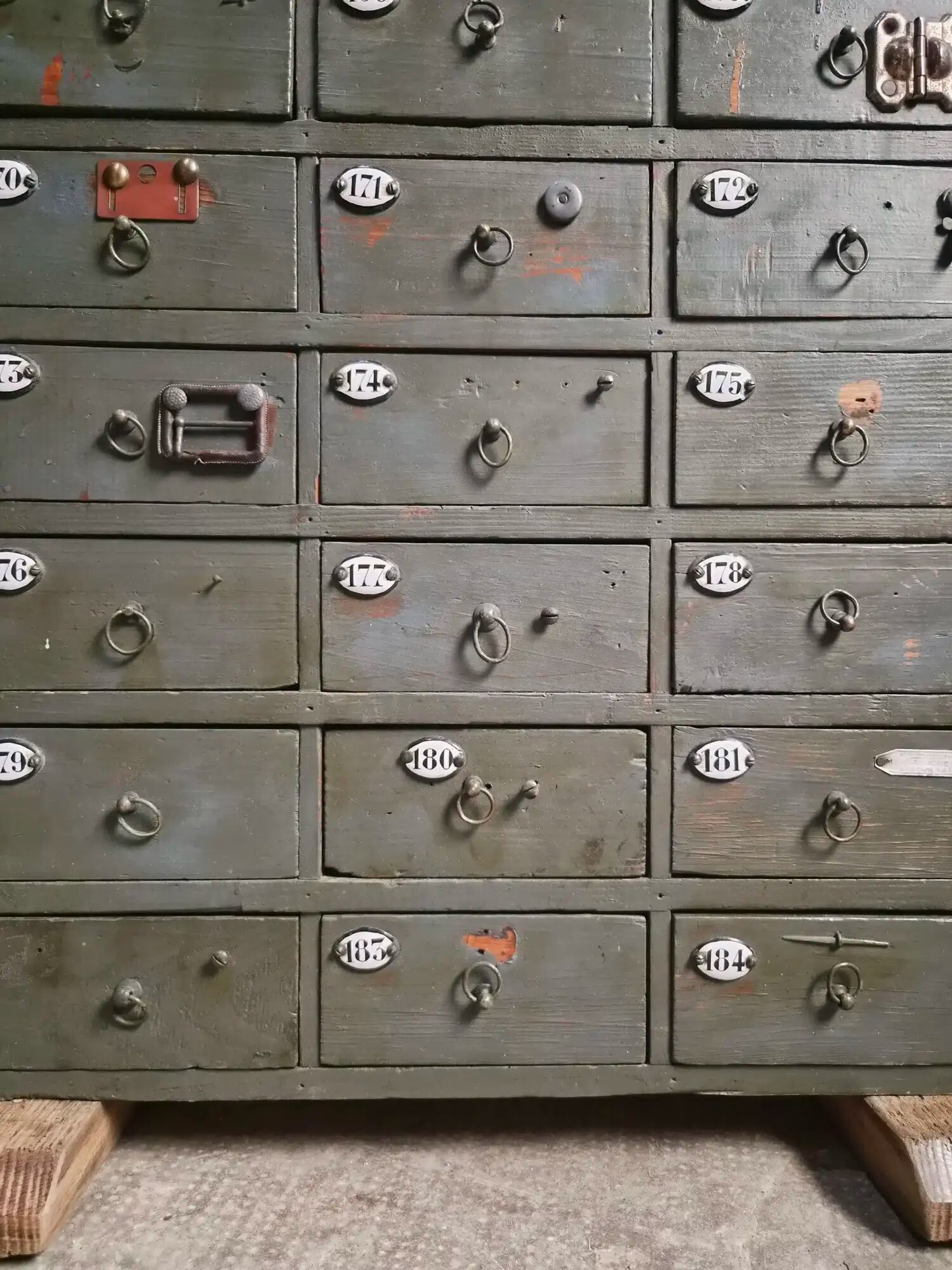 Antique hardware cabinet with 48 drawers, circa 1900.