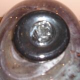 Vase with flattened body and Old Moorish inclusions